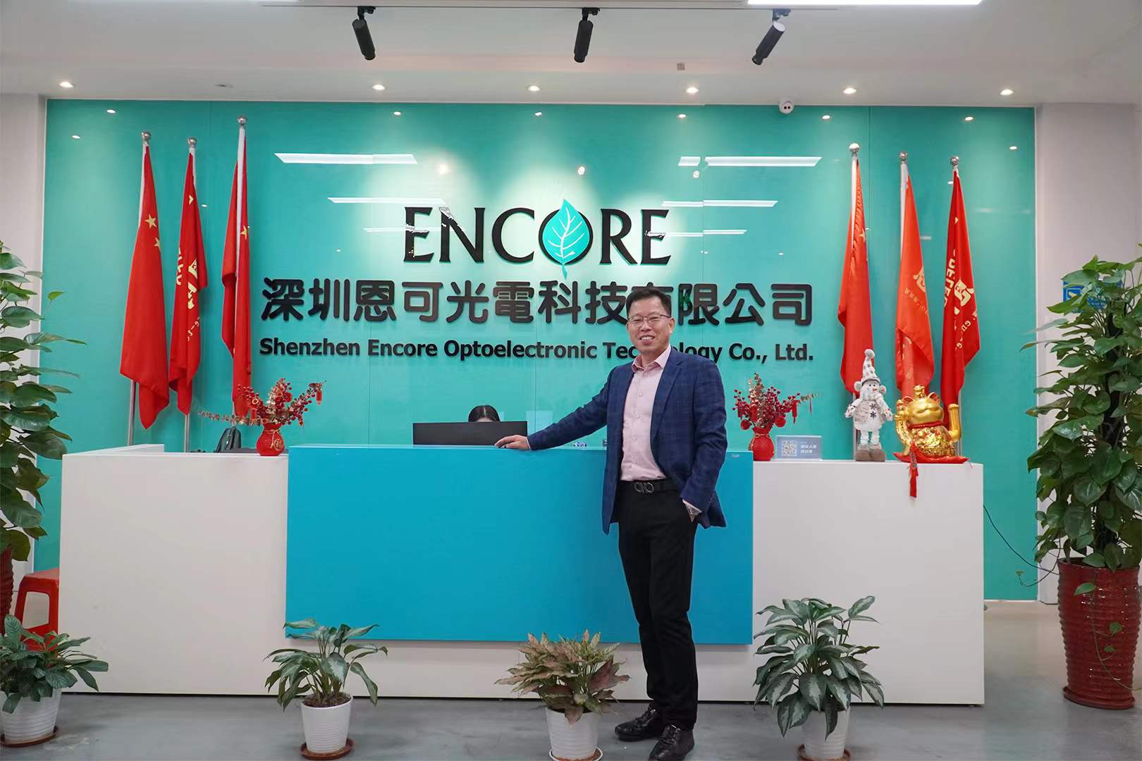 Rocky Wong in dark executive business suit during international trade expansion in 2024
